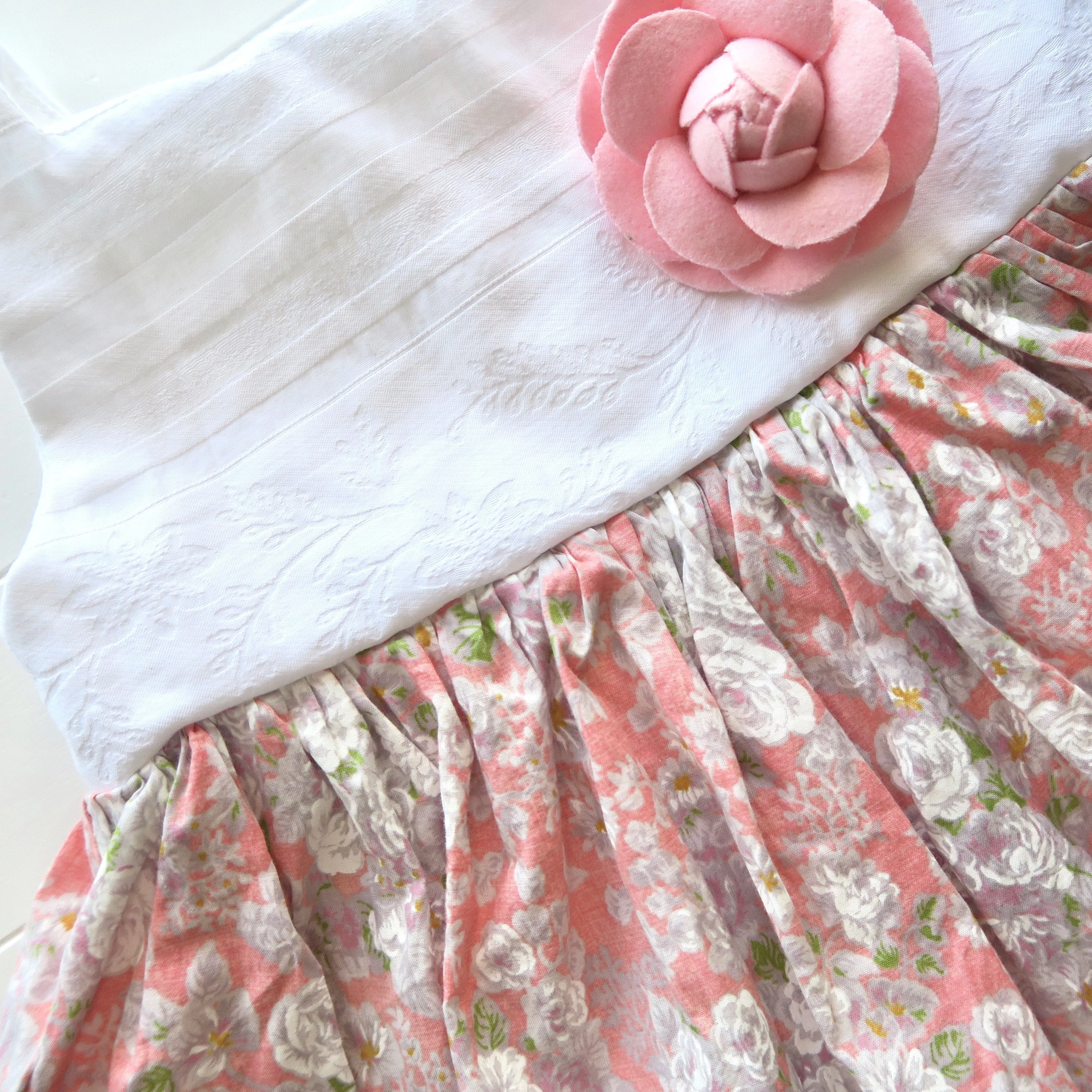 Poppy Dress in White Embroidery and Pale Flowers Pink